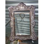 AN ANTIQUE SILVER MOUNTED AND TORTOISESHELL PHOTO FRAME, A PLATED TRAY, AND A SWAN VESTA.