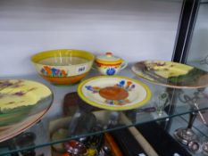 A CLARICE CLIFF BIZARRE CROCUS PATTERN BOWL, A SIMILAR PLATE, TWO DOULTON SERIES WARE PLATES AND A