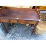 A VICTORIAN MAHOGANY TWO DRAWER SIDE TABLE.