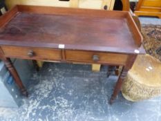 A VICTORIAN MAHOGANY TWO DRAWER SIDE TABLE.
