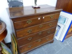 A GEORGIAN FRUITWOOD CHEST OF DRAWERS.