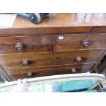 A VICTORIAN MAHOGANY CHEST OF DRAWERS.