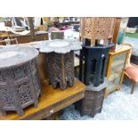 FIVE ORIENTAL OCTAGONAL OCCASIONAL TABLES, THREE WITH CARVED PANEL SIDES.