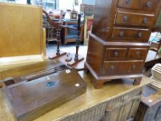 AN ANTIQUE MAHOGANY WRITING BOX, AND A MODERN MINIATURE CHEST OF DRAWERS.