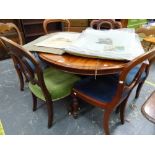 A VICTORIAN MAHOGANY BREAKFAST TABLE AND SIX VARIOUS VICTORIAN DINING CHAIRS.