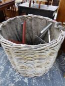 A VERY LARGE WICKER LOG BASKET.