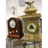 AN INLAID WOODEN MANTLE CLOCK,TOGETHER WITH A FURTHER FRENCH BRASS ORANTE MANTLE CLOCK.