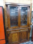 A VICTORIAN GLAZED BOOKCASE.