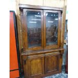 A VICTORIAN GLAZED BOOKCASE.