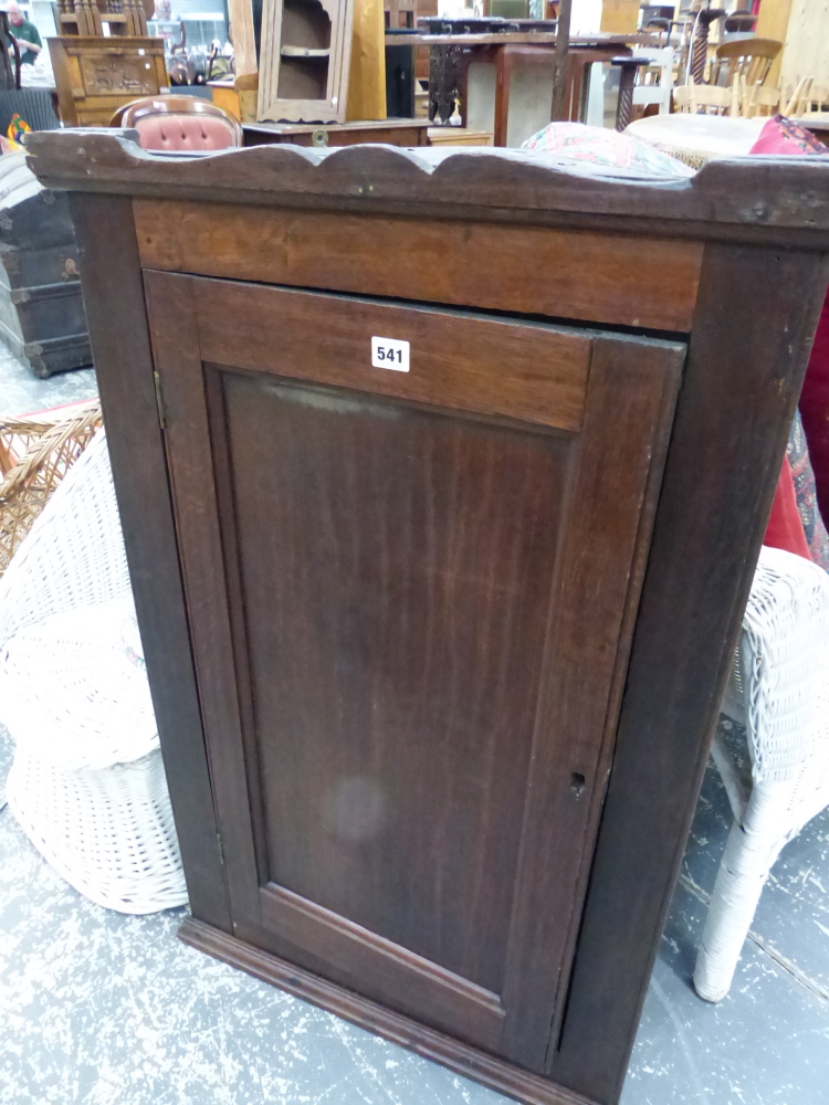 A GEORGIAN OAK CABINET.