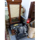 A NATIONAL CLOCKING IN CLOCK AND A PROJECTOR.