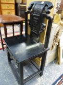 AN ORIENTAL EBONISED CHAIR.