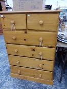 A MODERN PINE CHEST OF DRAWERS.