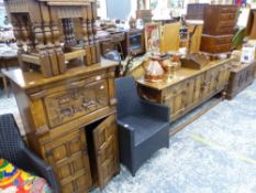 A BESPOKE OAK BUREAU, A MATCHING OAK SIDEBOARD, AND A SIMILAR NEST OF TABLES.