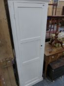 A SMALL PAINTED HALL CUPBOARD.