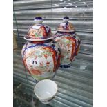 A PAIR OF JAPANESE LIDDED JARS AND A SMALL TEA BOWL.