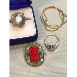 A SILVER ABALONE SHELL RING, A FURTHER SILVER SINGLE STONE RING, AN EGYPTIAN REVIVAL BROOCH, AND A