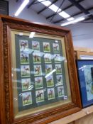 VINTAGE WILLS CIGARETTE CARDS IN CARVED OAK FRAME.