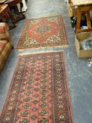 TWO SMALL RUGS.