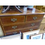 A MAHOGANY AND INLAID CHEST OF DRAWERS AND AN OCCASIONAL TABLE.