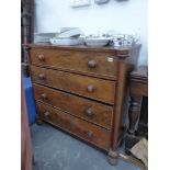 AN EARLY VICTORIAN MAHOGANY FOUR DRAWER CHEST.