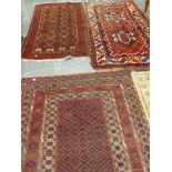 THREE VINTAGE HAND WOVEN EASTERN RUGS.