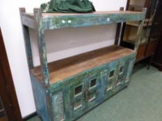 AN EASTERN HARDWOOD DUMB WAITER WITH CABINET BASE.