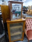 A PAIR OF MODERN BUTTON BACK NURSING CHAIRS, A GLAZED SIDE CABINET AND A MIRROR DOOR WALL CABINET.