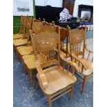 A SET OF TEN AMERICAN SPINDLE BACK DINING CHAIRS, INC. TWO ARMCHAIRS.