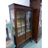 AN EDWARDIAN INLAID DISPLAY CABINET.