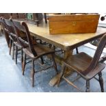 AN ANTIQUE STYLE OAK REFECTORY TABLE.