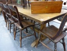 AN ANTIQUE STYLE OAK REFECTORY TABLE.