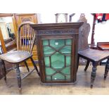 AN EARLY 19th C. WINDSOR SIDE CHAIR, AN OAK HALL CHAIR, AND AN OAK CORNER CABINET.