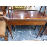 A REGENCY MAHOGANY AND INLAID FOLD OVER CARD TABLE.