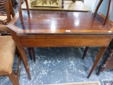 A REGENCY MAHOGANY AND INLAID FOLD OVER CARD TABLE.