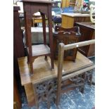 AN ANTIQUE ELM BLANKET BOX, A CARVED GOTHIC PANEL, A TABLE CABINET, PLANT STAND AND A TOWEL RAIL.