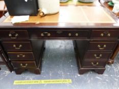 A MAHOGANY TWIN PEDESTAL DESK.