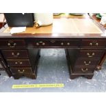 A MAHOGANY TWIN PEDESTAL DESK.