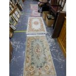 FOUR EASTERN STYLE RUGS.
