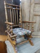 A VINTAGE CHILD'S ROCKING CHAIR AND A BEDROOM CHAIR.