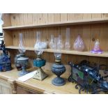 THREE ANTIQUE OIL LAMPS, THREE STAIN GLASS HALL LANTERNS, ETC.