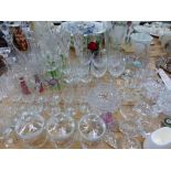 A QUANTITY OF VARIOUS DECANTERS AND OTHER GLASS WARES ETC.