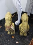 A PAIR OF PELICAN GARDEN ORNAMENTS.