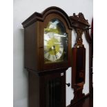 A MODERN LONG CASE CLOCK.