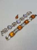 A GERMAN CONTINENTAL SILVER AND AMBER LINKED BRACELET STAMPED 835 TOGETHER WITH A PAINTED PANEL