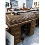 A TAMBOUR TOP WRITING DESK.