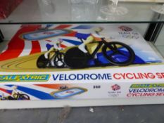 A SCALEXTRIC VELODROME CYCLING SET, BOXED.