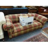 A DROP ARM CHESTERFIELD SETTEE.