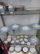 A ROYAL DOULTON REFLECTIONS PATTERN DINNER SERVICE AND A LIMOGES PART DINNER SERVICE.