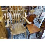 A WILLIAM IV HALL CHAIR AND A VICTORIAN SLAT BACK KITCHEN ARM CHAIR, TOGETHER WITH A FIRE FENDER AND